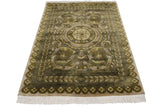 Embossed contour blossom border, polished wool pile, and white fringe on the Indian Savonnerie rug.