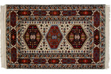 Vintage Indian Caucasian rug, ivory field with triple hexagonal medallions and geometric borders.