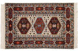 Corner of vintage Indian Caucasian rug, showcasing multi-cartouche and serpent borders.