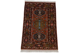 Vintage Indian rug corner detail: Rust field with geometric plants and multi-cartouche border.