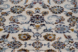 Intricate ivory field pattern with navy, bronze, and pale rose palmettes and vines.