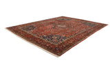 Full composition of a collector's mid-century Persian Bakhtiari carpet from a high-angle perspective.