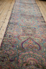 Vintage Kerman runner, ornate floral blossoms and sprawling budded vines in sky blue and rose.