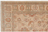 Sultanabad design carpet corner showcasing floral palmettes, red leaves, and blue-green vinery.