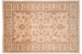 Corner detail of vintage Sultanabad rug: ivory field, floral palmettes, serrated leaves, red, blue-green tones, fringe.