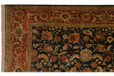 Detail of a vintage Indian carpet corner with its terracotta turtle samovar border and fringe.