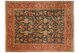 Vintage Serapi design carpet featuring a forest green field with floral vinery and a rich terracotta border.