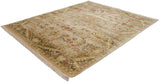 Flowing olive border and sprawling red floral palmettes on a cream vintage Indian carpet corner.