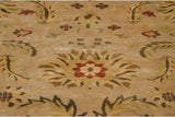 Lustrous wool texture reveals an expressive floral petal palmette in cinnabar red, cream, and olive.