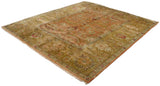 Angled perspective of a vintage square Agra rug showing its sprawling floral design and luster.
