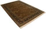 Vintage Indian Tabriz carpet with floral patterns in copper and navy, viewed from an angle.