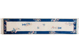 Art Deco runner, ivory field with blue vased plants, butterflies, and thick banded border.
