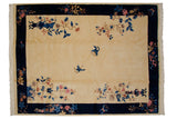 Vintage Chinese Art Deco carpet featuring an ivory field, cobalt blue border, floral sprays, and butterflies, 9x12.