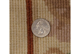 Peking rug hand-knotted pile detail, showing original full height with quarter for scale.