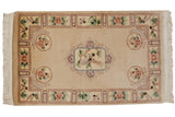 Cream vintage Chinese Peking rug with central lovebirds, floral tendrils, and pastel floral border, 3x5.
