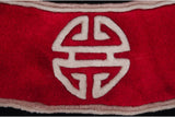 Plush cherry red hand-knotted Chinese Peking pile featuring a silver symbol.
