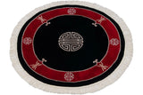 Traditional Peking rug: cherry red border with silver symbol, black field, and fringe.