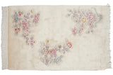 Cream Art Deco rug, plush triple floral sprays in rose, mauve, and silver.