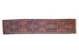Vintage Tabriz rug runner with triple center medallions and floral blossoms in navy blue and brick red.