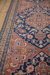 Close view of the original side cord and floral Herati motifs of a vintage Tabriz collector rug.