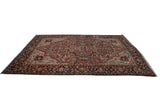 Perspective view of a collector's vintage Bakshaish carpet, highlighting its grand scale and sprawling floral arabesques.