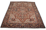 Full view of a vintage Bakshaish carpet showing its grand scale and complex geometric medallion.