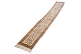 Angled full-length view of a hand-knotted Persian Tabriz runner with blossoming branch motifs.