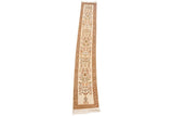 Vintage Tabriz rug runner laid out at an angle showing its full length and proportions.