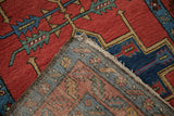 Corner detail showing the hand-knotted foundation and wool pile of an antique Persian runner.