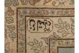 Detailed view of the weaver's insignia cartouche in the beige and powder blue minor border.