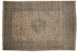 Detail of the powder blue diamond medallion and intricate floral sprays on a cream field.
