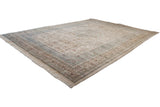 Angled perspective of a large vintage Tabriz carpet, highlighting its full pile and soft palette.