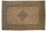 Vintage Persian Tabriz carpet with a floral field, powder blue medallion, and multi-layered border.