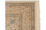 Original ivory fringe and side cord selvage on a vintage Persian Tabriz carpet corner.