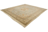 Corner perspective of the vintage Tabriz square carpet showing its intricate border and ivory fringe.