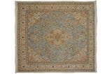 Square vintage Persian Tabriz rug with perched peacocks and florals on a powder blue field.