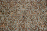 Traditional pictorial Persian Tabriz carpet with powder blue ground, deer, birds, and blossoming forest.