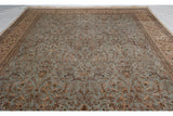 Powder blue field detail on vintage Tabriz carpet: pictorial deer, birds, blossomed trees.