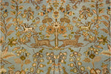 Symmetrical deer and antelope pictorial motif under a blossomed tree on the powder blue field.