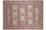Vintage Indian carpet with a Voysey-inspired trellis of arched branches and medallions.