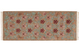 Vintage Indian Arts and Crafts runner, beige field of carved floral vines and palmettes.