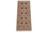 Indian Arts and Crafts runner corner: carved palmettes and vines in beige, sea foam, rose.