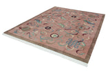 Dusty blush Vintage Indian Peking carpet with sculpted cloudband and knot motifs, brown border.