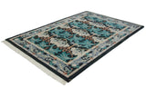 Angled profile of a vintage William Morris rug with plush pile and sprawling floral designs.