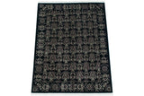 Angled perspective of the vintage Indian carpet, showing the full unidirectional damask pattern repeat.