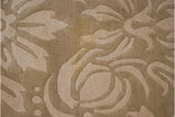 Shallow carved beige Savonnerie floral pattern with subtle saffron highlights and small stain.