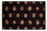 Shallow carved contours define the burgundy trellis and floral blossoms on a black field.