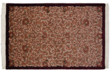 Vintage Indian European design carpet showing shallow carved texture and rococo vinery.