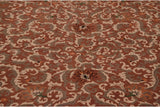 Shallow carved contour of Rococo vinery and floral motifs in terracotta, ivory, and sandalwood.
