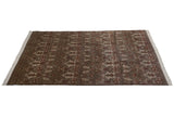 Allover damask pattern featuring scrolled floral motifs, shallow carved contour, and earthy tones.